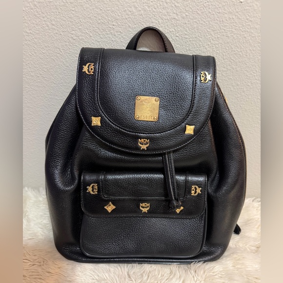 MCM Other - MCM Black Backpack with Gold Accents